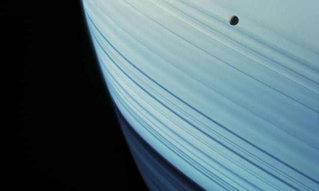 Mimas transits Saturn’s ring shadows x650